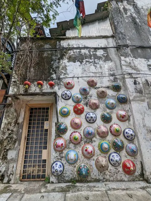 A wall of colorful conical hats in Ipoh, Malaysia