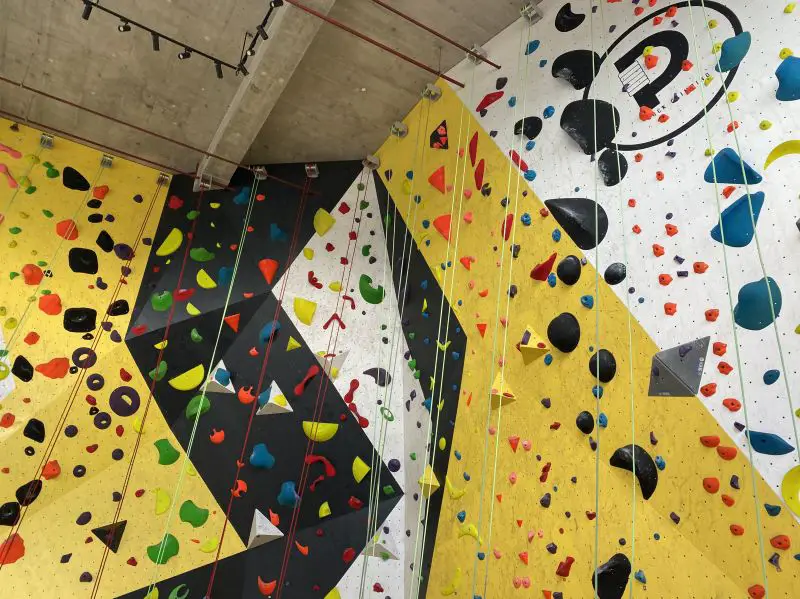 Yellow and black climbing walls and colorful ropes for indoor climbing at PAMPA Rock Climbing in Melaka, Malaysia