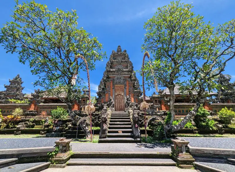 A temple with a short staircase leading to it in Bali's Ubud Area