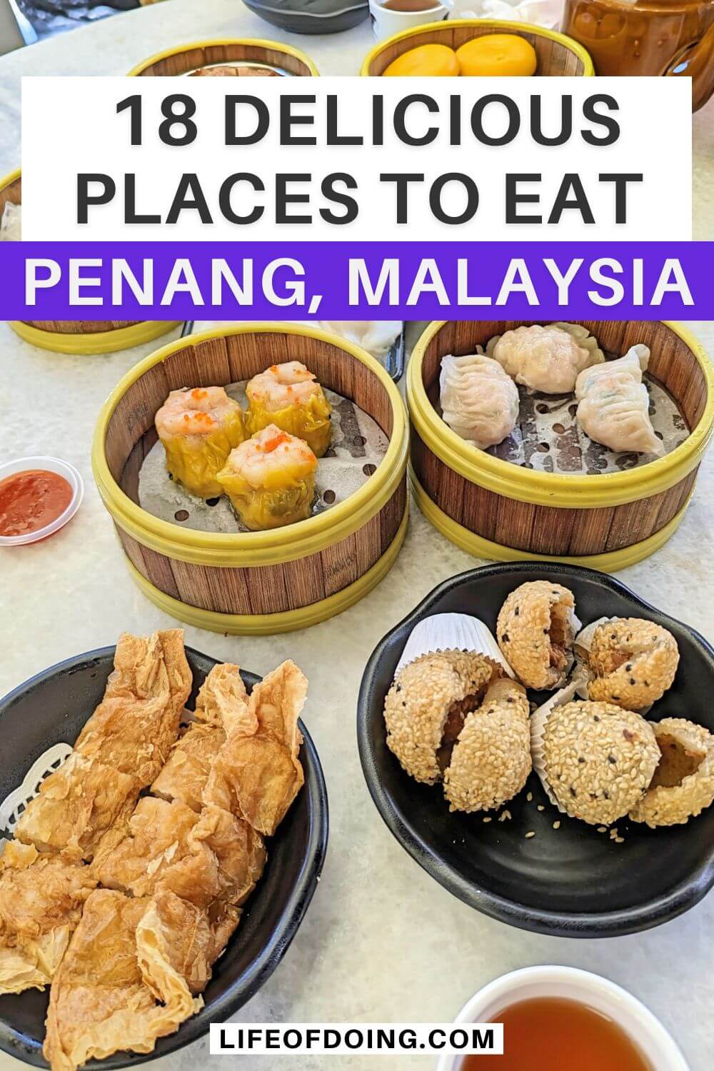 A table at Penang's Fu Er Dai with small places of dim sum such as sesame balls, crispy shrimp rolls, steamed pork dumplings, steamed shrimp dumplings