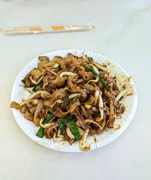 A plate of char koay teow, stir fried noodles with bean sprouts and fish cakes at Penang Road Famous Laksa in Penang