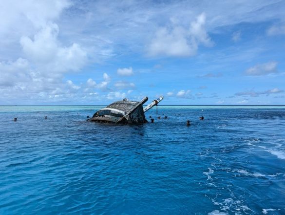 People snorkeling around the Vaanu shipwreck, one of the sites for the Shipwreck excursion tour from Maafushi, Maldives
