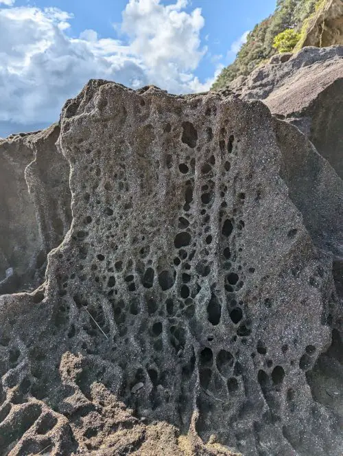Natural sea erosions of holes in the cliffside at Onigajo Cliffside, Japan