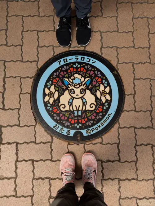 Alolan Vulpix, a white fox with ice powers from the Pokemon series, has its own Pokemon Poke Lid in Otaru