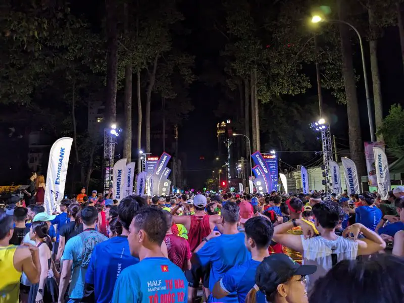 Crowds of people waiting for the Ho Chi Minh City Night Run Eximbank half marathon corral