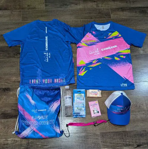 Ho Chi Minh City Night Run swag includes a t-shirt, drawstring bag, water bottle, tissue, wet napkins, hat, and a running belt