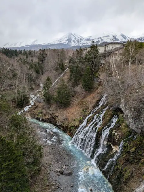 Small waterfall cascades at Shirahige Waterfall in Biei, Hokkaido