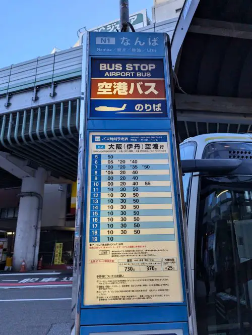 A bus schedule posted next to the Namba bus stop and will travel to Osaka Airport