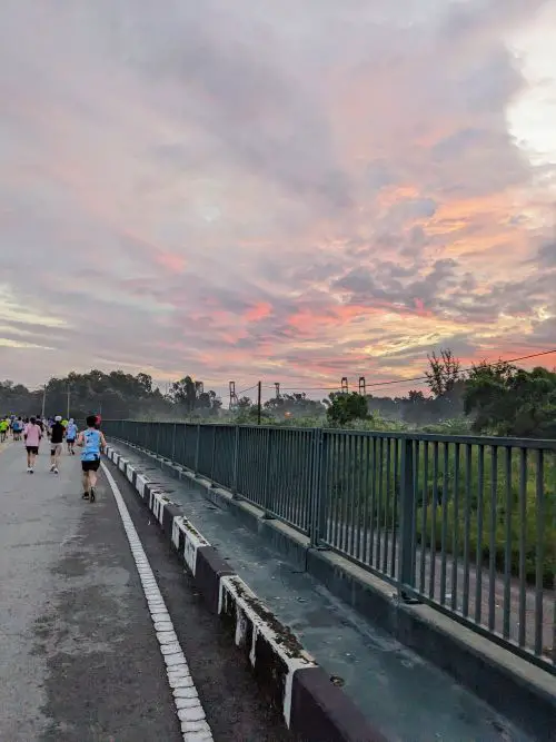 A photo of the pink and orange sunrise along the Garmin Run Vietnam half marathon race