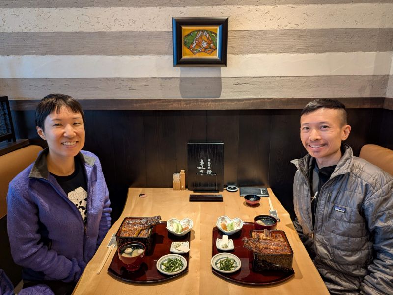 Jackie Szeto and Justin Huynh, Life Of Doing, enjoy a meal of grilled eel (unagi) on top of rice at Hamamatsujiyaki Eel Masa in Hamamatsu, Japan