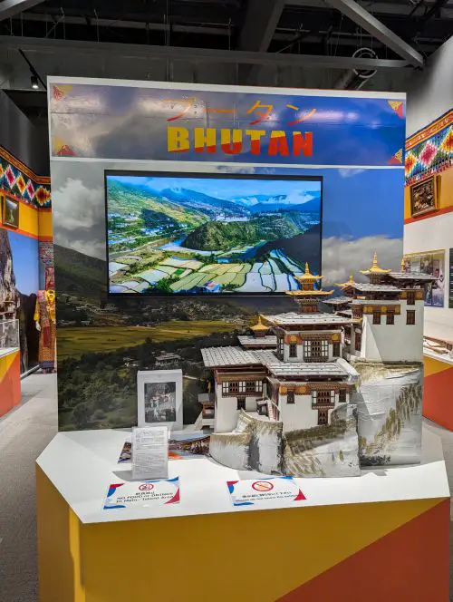 Bhutan Pavilion with a mini Paro Taktsang (Tiger's Nest Monastery) on display