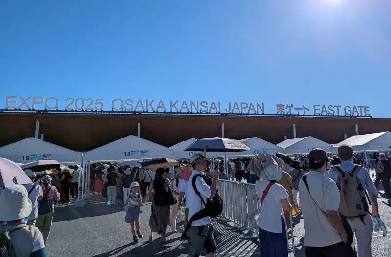 Crowds of people entering the Osaka Expo East Gate's Security