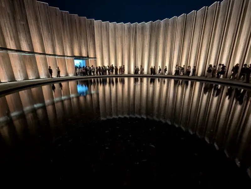 Japan Pavilion's Pristine Water exhibit with a pond of clean water surrounded by wooden walls