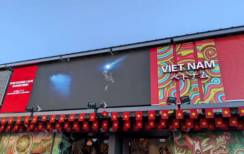 Outside of the Vietnam Pavilion with TV screen and Vietnam flags