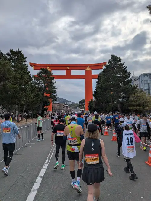 Kyoto Marathon finish line in front of the large orange torii